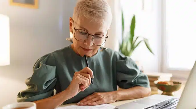 Therapist reading the AGE Scanner results, highlighting health and biological aging insights
